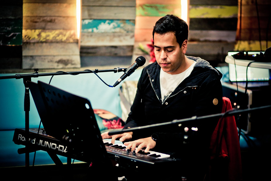 Music teacher providing keyboard lessons at Besharp Music School, Adelaide, nurturing students skills and musical expression.