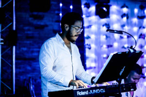 Keyboard teacher at Besharp Music School, Adelaide, instructing students with passion and fostering musical growth.