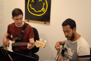 Gallery Music School, Two teenagers collaboratively playing guitars at Besharp Music School, Adelaide, showing teamwork and musical passion., cello instructor near me, music and movement classes for toddlers, huitar lessons, music high school, art school, mysic school, music shops in adelaide, music lesson adelaide, preschool music class, kids flute lessons, high school music school, flute training near me, school music instruments, saz lessons, toddler music class, music class for children near me, deum lessons, music classes for toddlers near me, music classes kids, music store adelaide, music lessons brighton, keyboard teacher near me, learn banjo, music keyboard lessons, private violin lessons, open music academy adelaide, violin lessons for kids, percussion teacher near me, harmonium lessons near me, music lessons for 4 year olds near me, music lessons and production adelaide australia, music academy, violin lesson, violin teachers near me, musician course, cello lessons for adults near me, ukulele workshop, writing classes for kids, writing classes for kids near me, best violin classes near me, saxophone lessons for adults, 